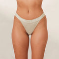 String Lounge Beige Nude Logo
